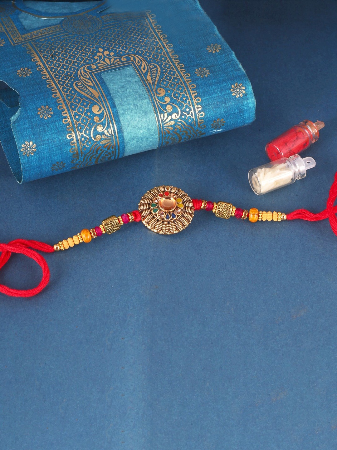 

Vighnaharta Boys Gold & Rhodium-Plated Stones Studded Lotus Thread Rakhi