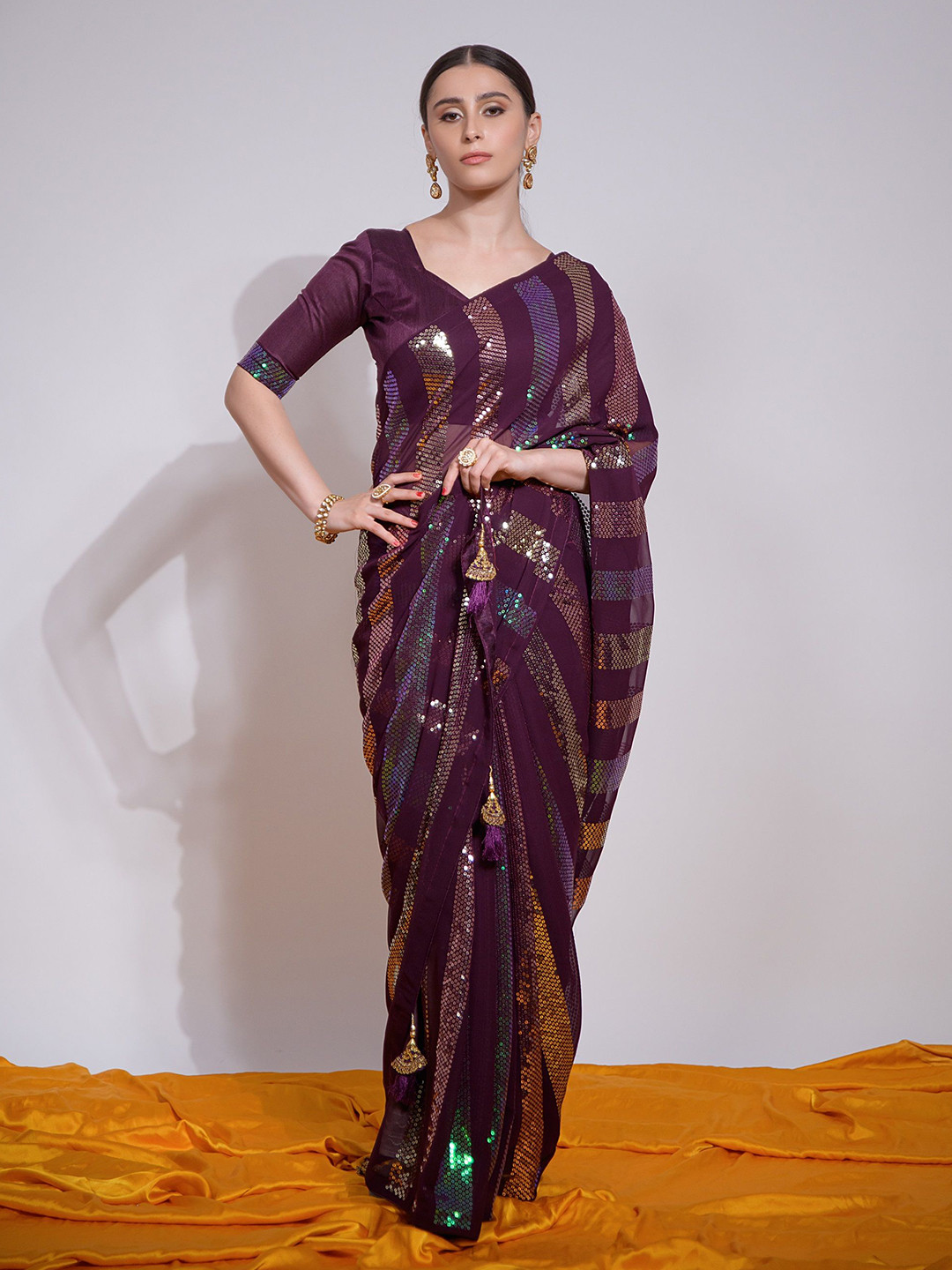 

KALINI Embellished Sequinned Pure Georgette Heavy Work Saree, Magenta