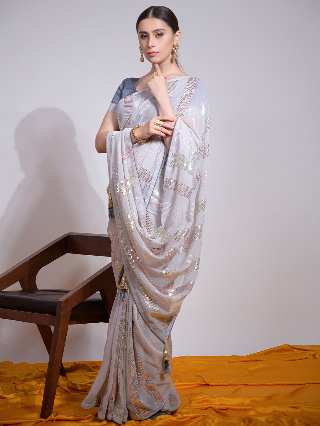 

KALINI Striped Sequinned Pure Georgette Heavy Work Tassel Saree, Grey