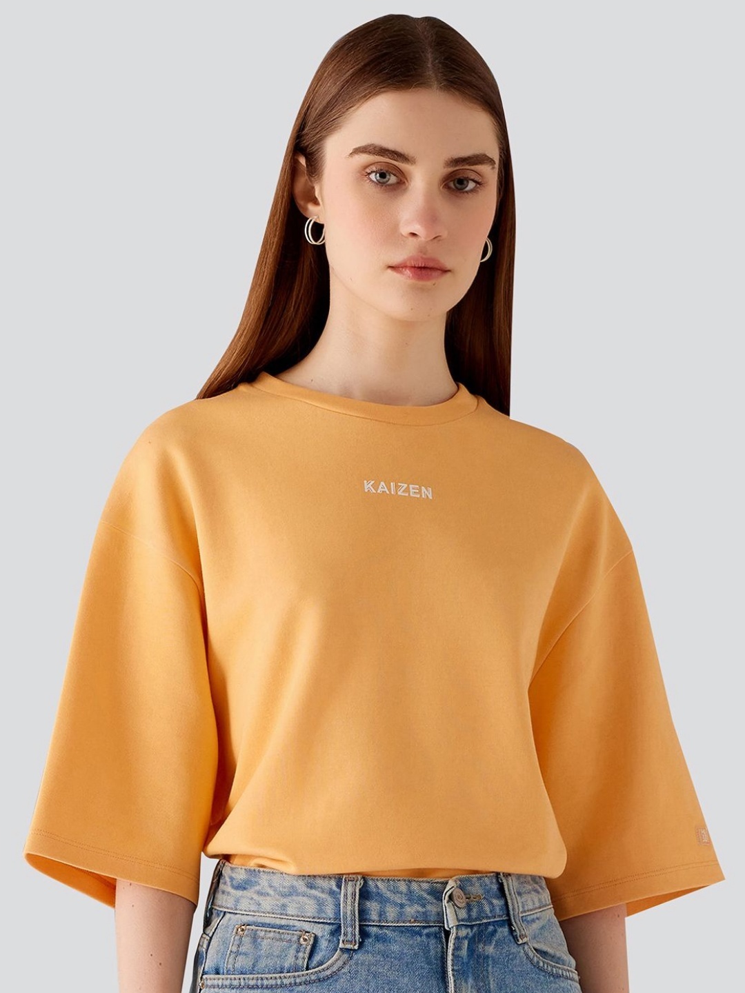 

Muvazo Unisex Round Neck Pockets T-shirt, Orange