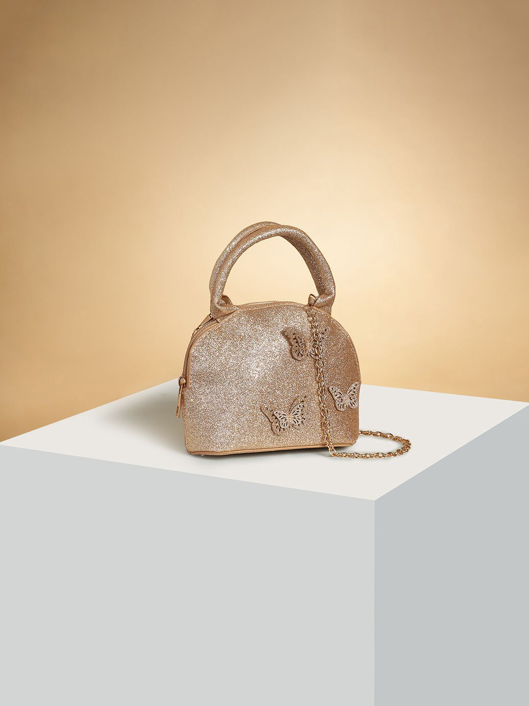 

Pantaloons Junior PU Oversized Structured Handheld Bag with Cut Work, Gold