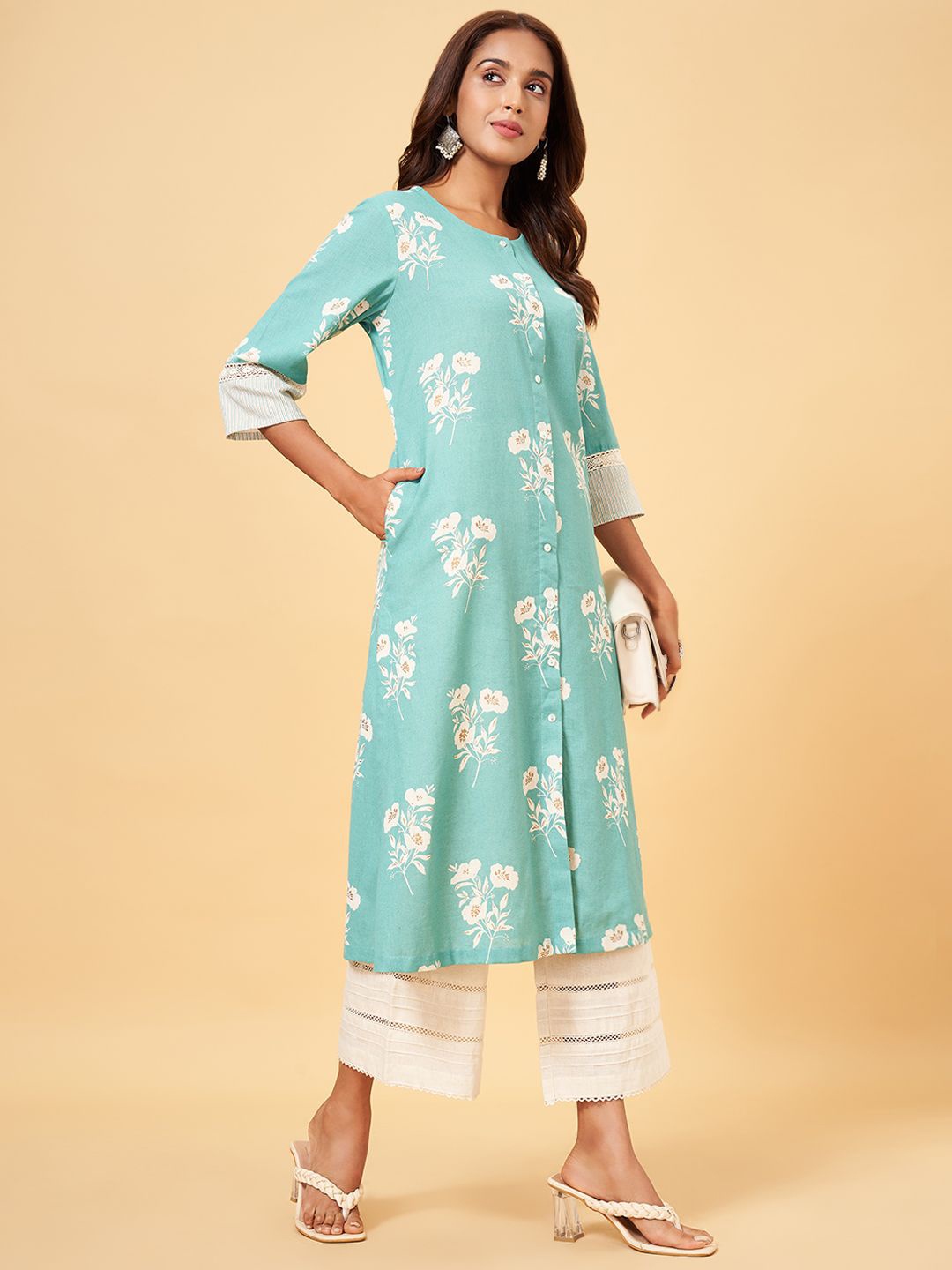 

RANGMANCH BY PANTALOONS Women Flared Palazzos, Cream