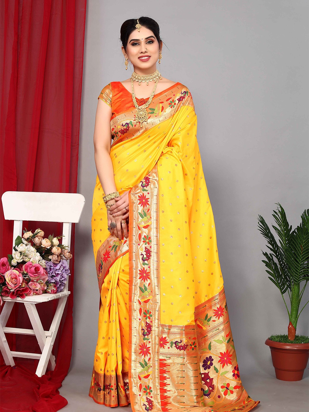 

Aardiva Woven Design Zari Pure Silk Paithani Saree, Yellow