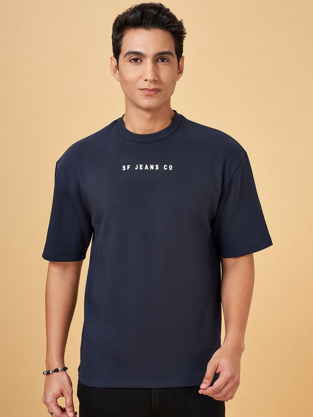 

SF JEANS by Pantaloons Men Solid Round Neck Cotton Oversized Tshirt, Teal