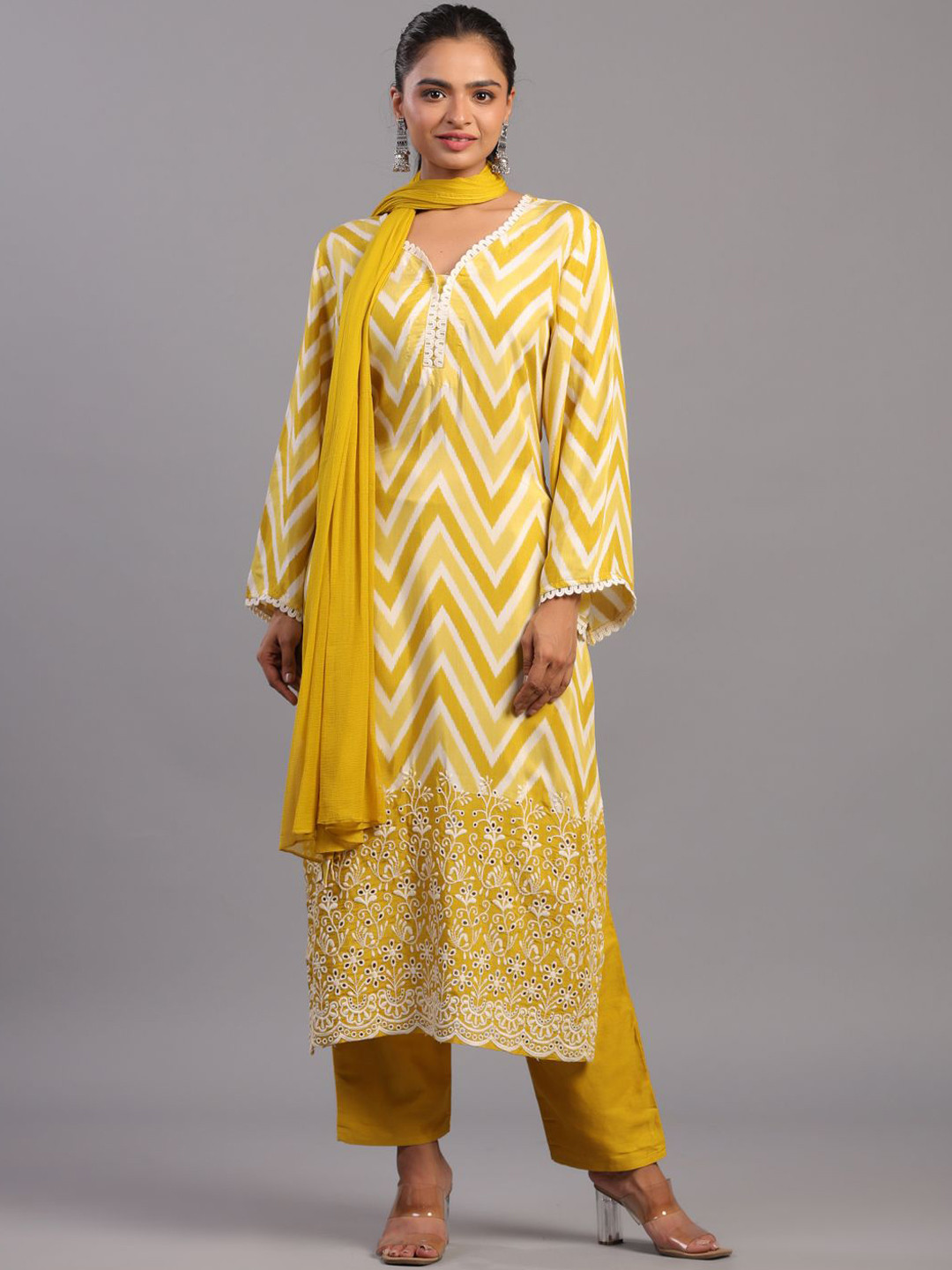 

Amchoor Chevron Printed Regular Thread Work Kurta With Trousers & Dupatta, Mustard