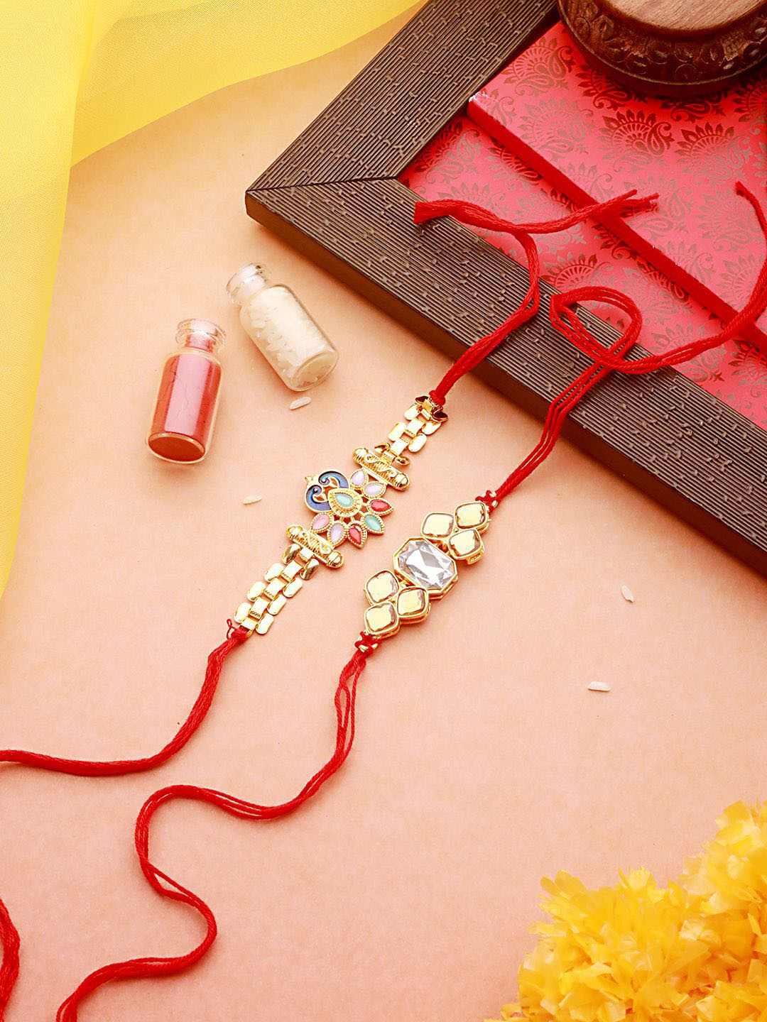 

Anouk Gold-Toned Set of 2 Kundan-Studded & Beaded Rakhi with Roli Chawal