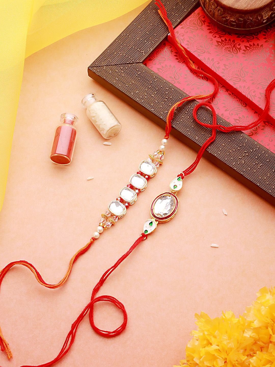 

Anouk Set Of 2 Kundan Studded & Chain Thread Rakhi With Roli Chawal, Gold