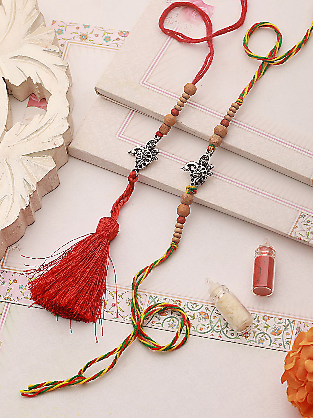 

Anouk Yellow Set of 2 Beaded Bhaiya Bhabhi Rakhi with Roli Chawal