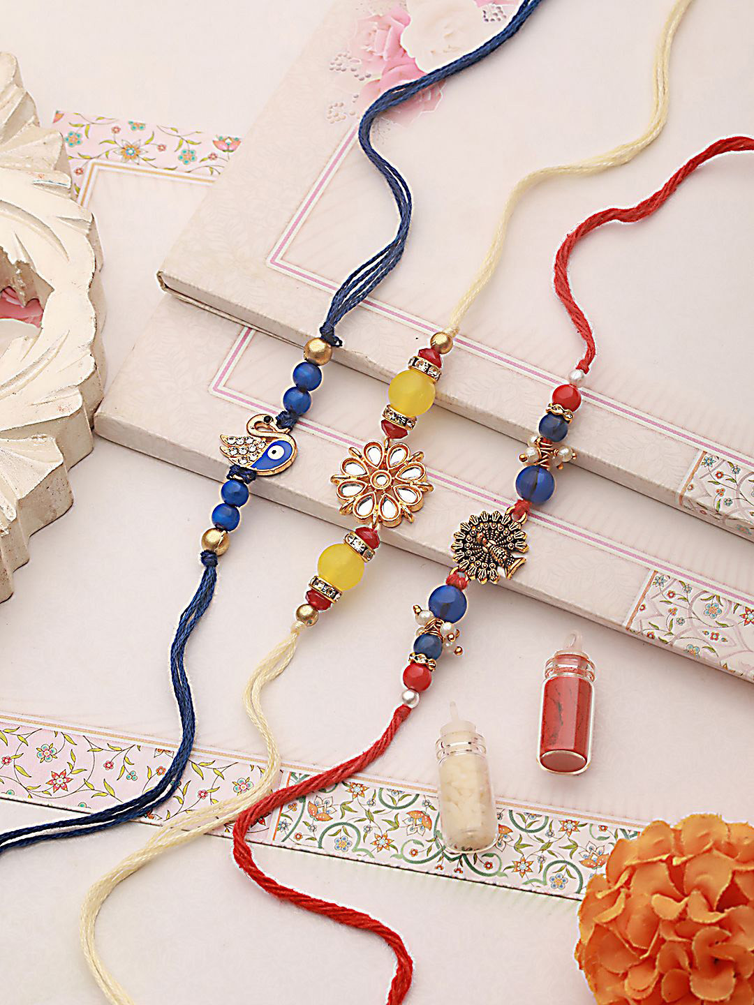 

Anouk Yellow Set of 3 Pearl-Beaded Bhaiya Bhabhi Rakhi with Roli Chawal