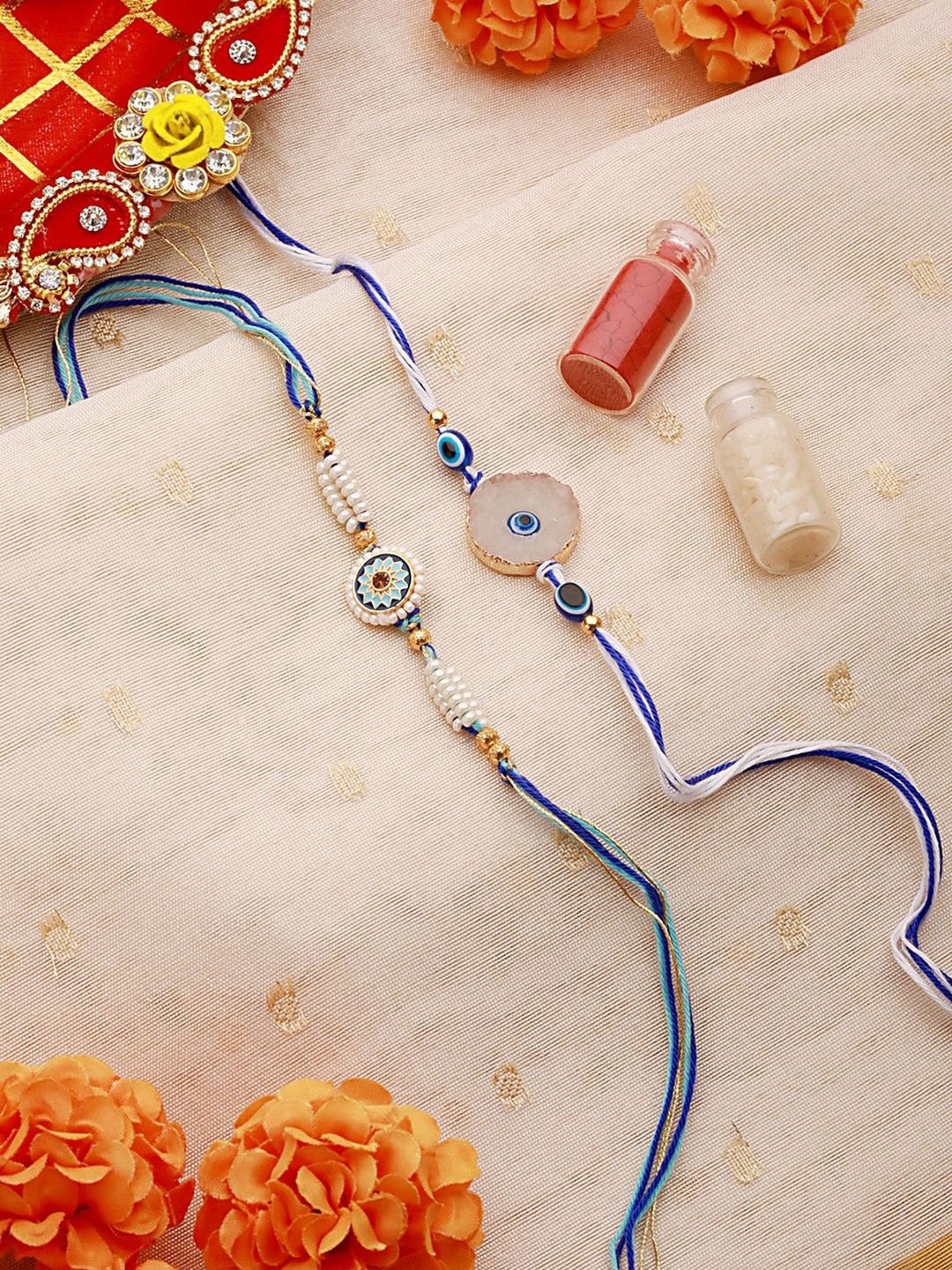 

Sangria Blue Set Of 2 Evil Eye & Pearl Beaded Charm Thread Rakhis With Roli Chawal
