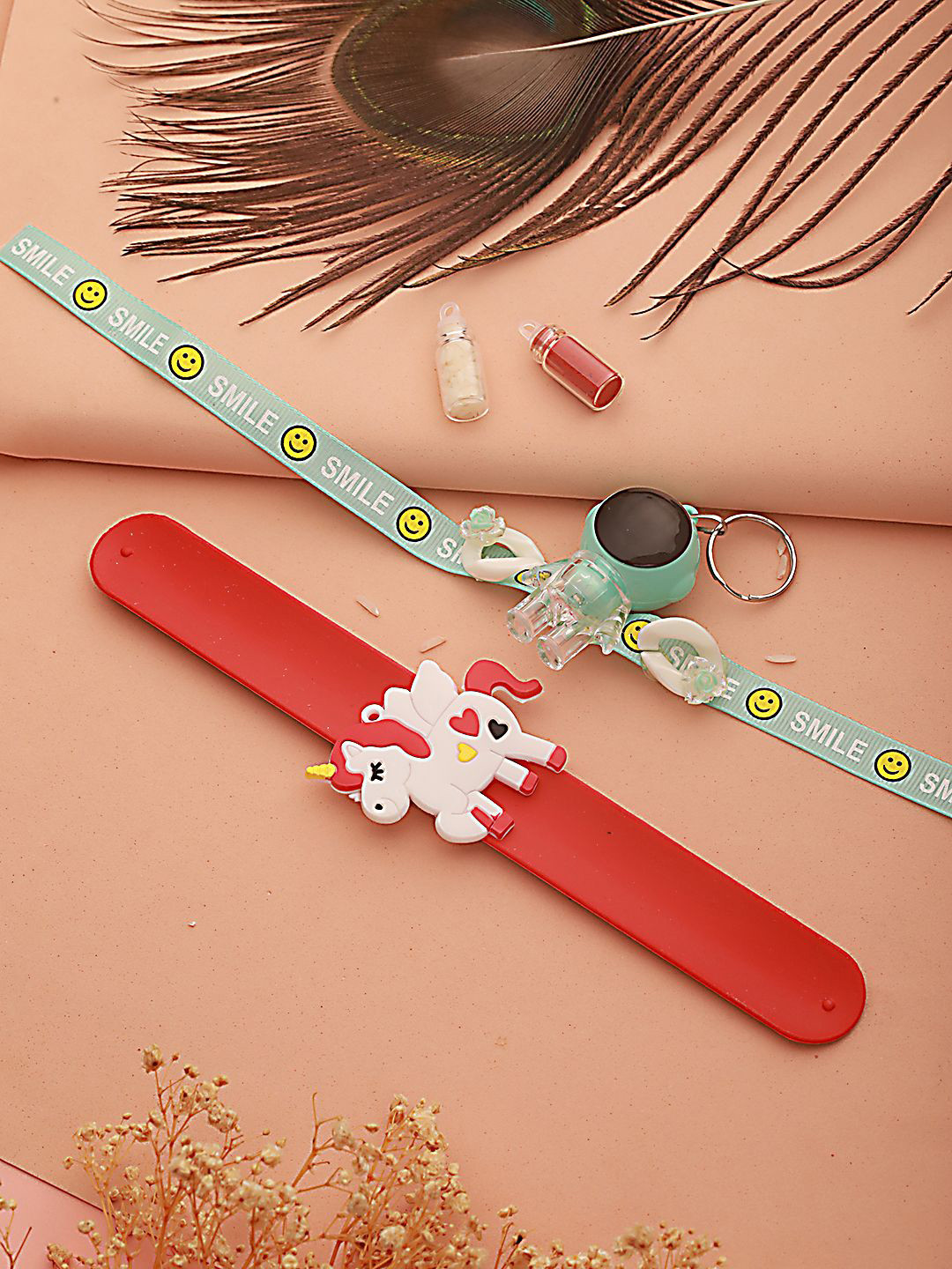 

Kook N Keech Red Set of 2 Light Robot & Unicorn Band Wraparound Rakhi with Roli Chawal