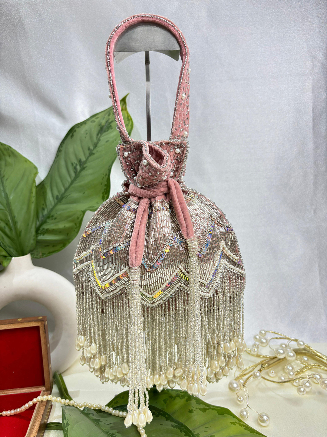 

trendy crafts Embellished Tasselled Potli Clutch, Pink