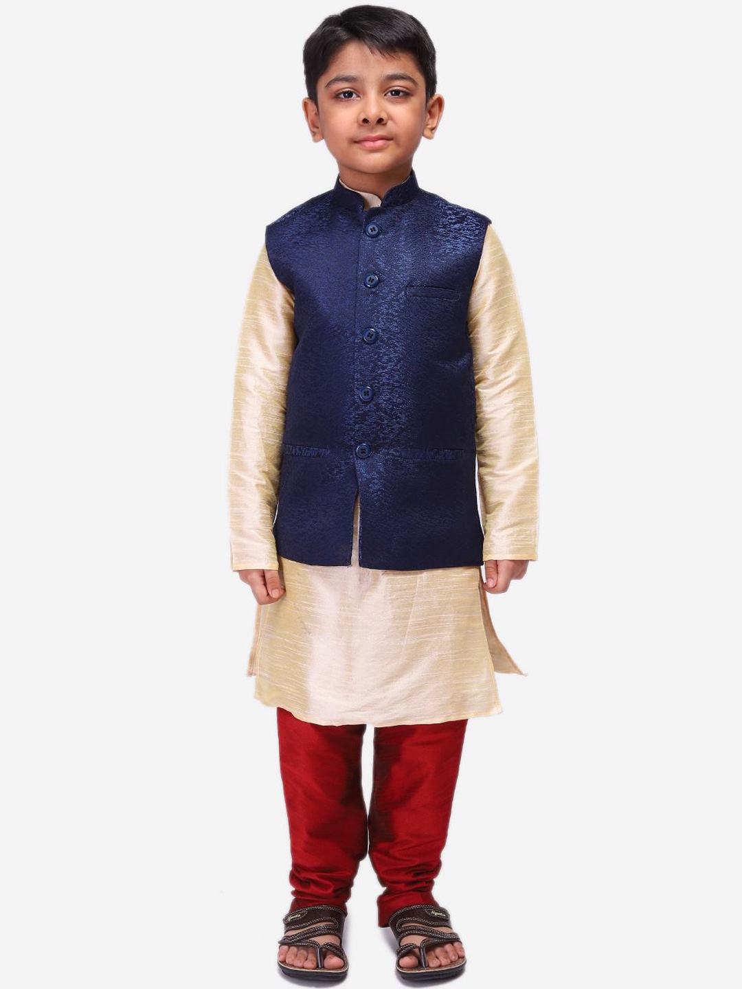 

NAMASKAR Boys Mandarin Collar Dupion Silk Straight Kurta With Churidar & Nehru Jacket, Gold