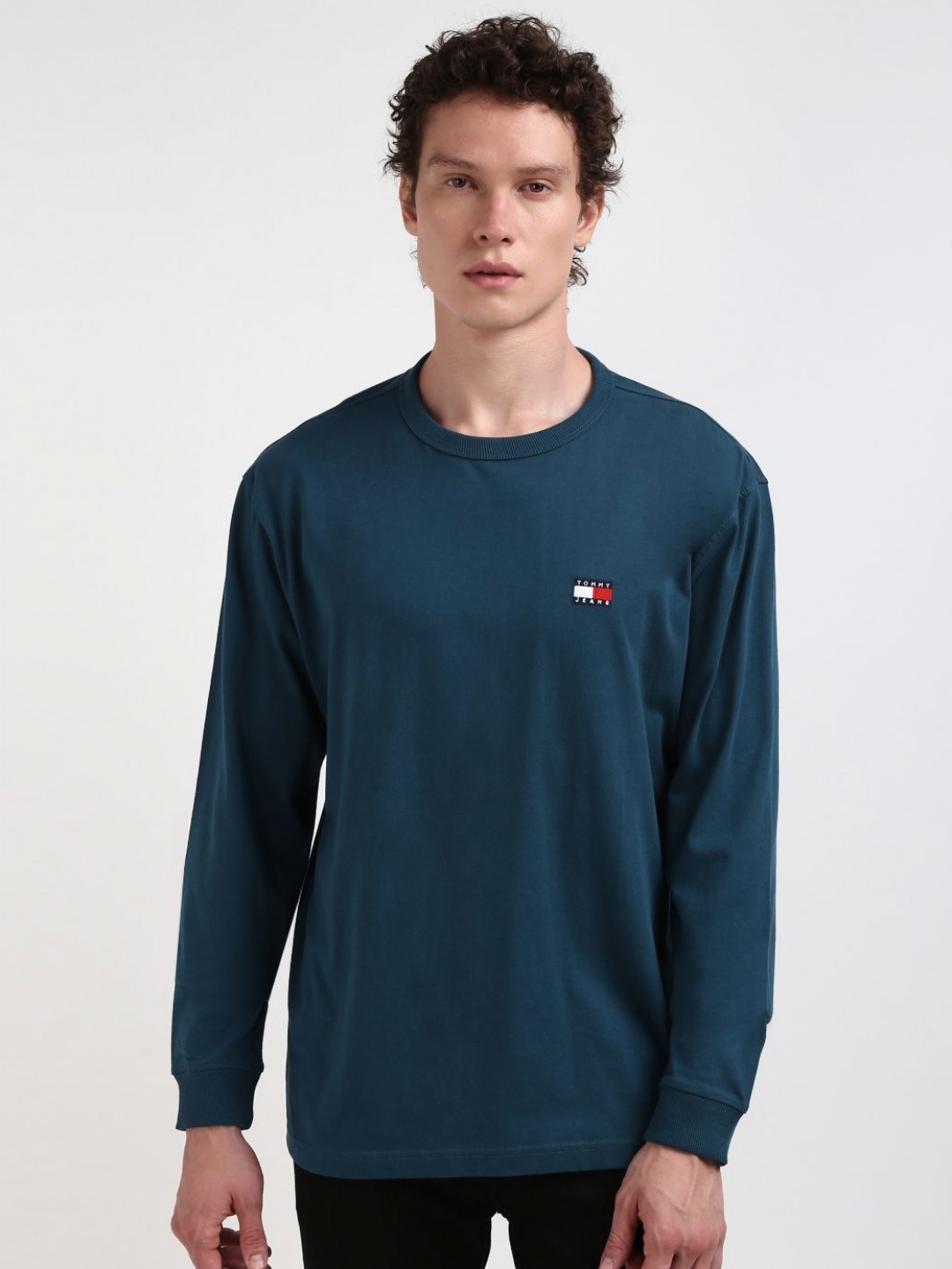 

Tommy Hilfiger Men Solid Round Neck Cotton T-Shirt, Teal