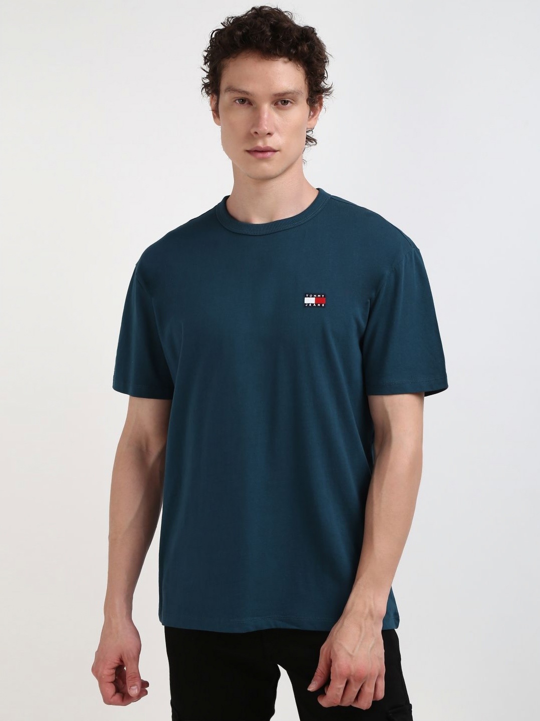

Tommy Hilfiger Men Solid Round Neck Cotton T-Shirt, Teal