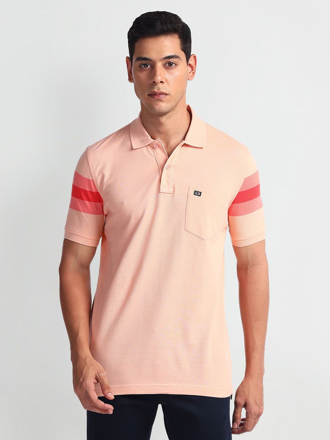 

Arrow Sport Men Solid Polo Collar Cotton Tshirt, Orange