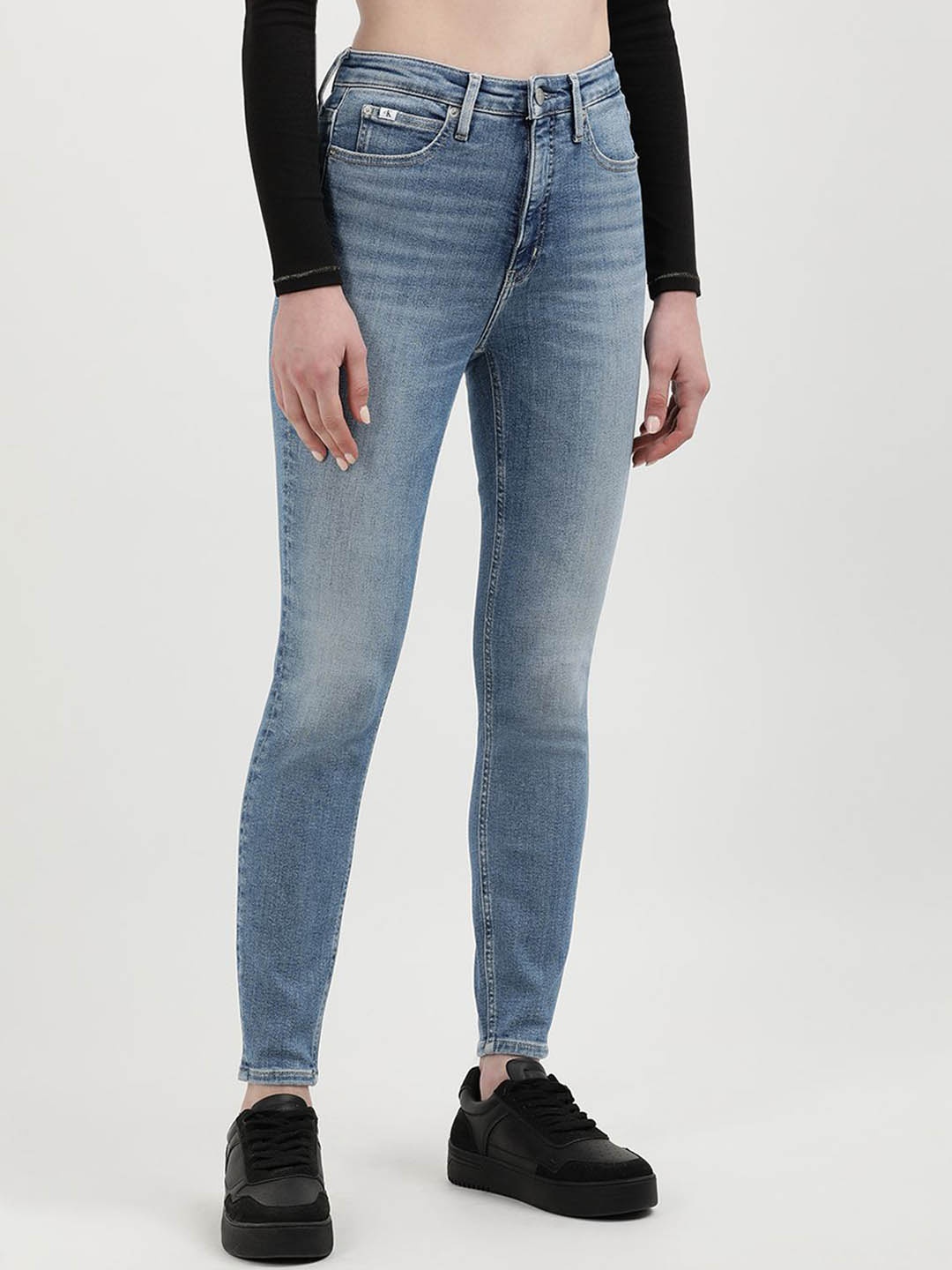 

Calvin Klein Jeans Women Mid Rise Skinny Fit Heavy Fade Jeans, Blue