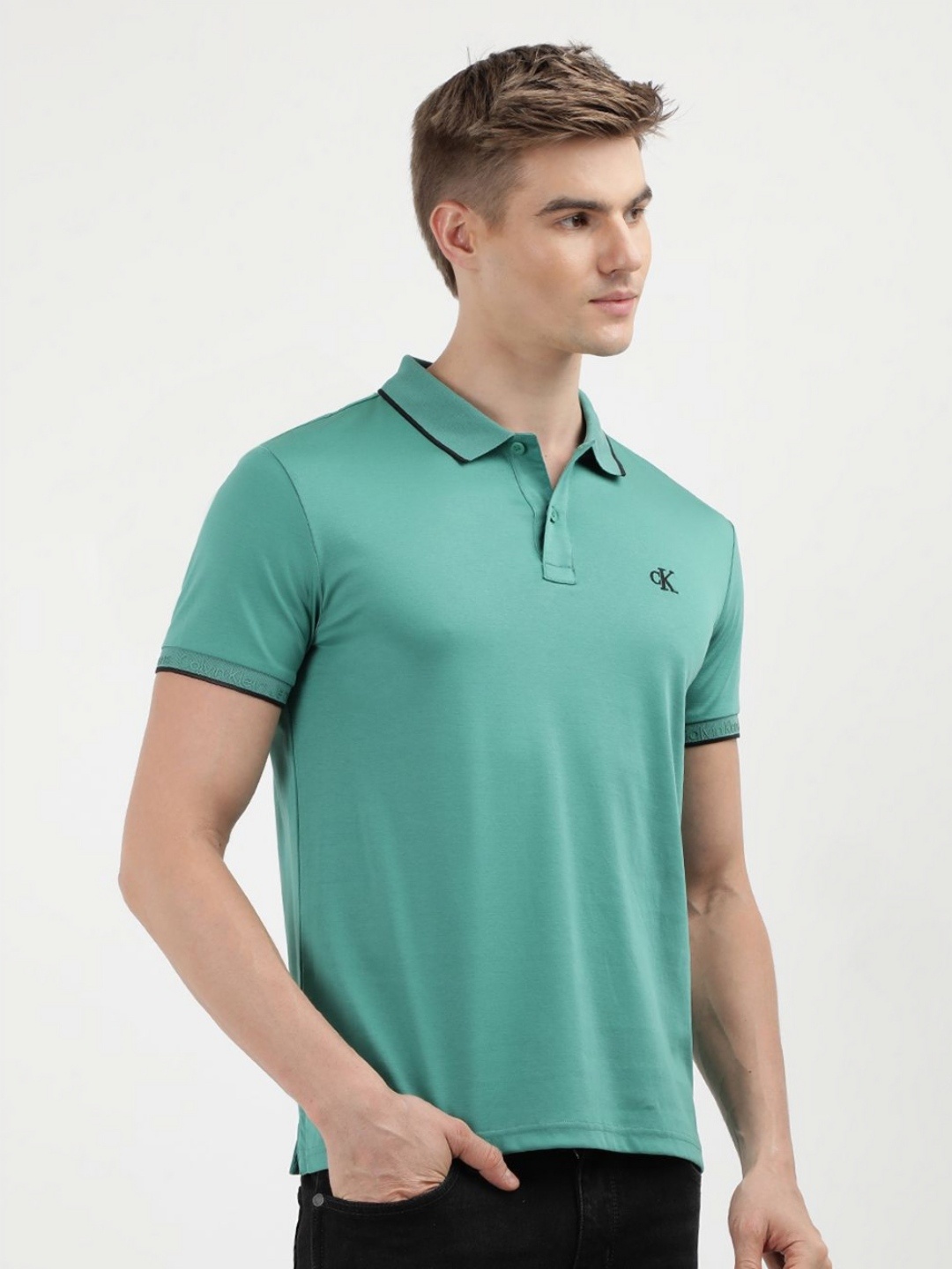 

Calvin Klein Jeans Men Solid Polo Collar Cotton Slim Fit Tshirt, Green