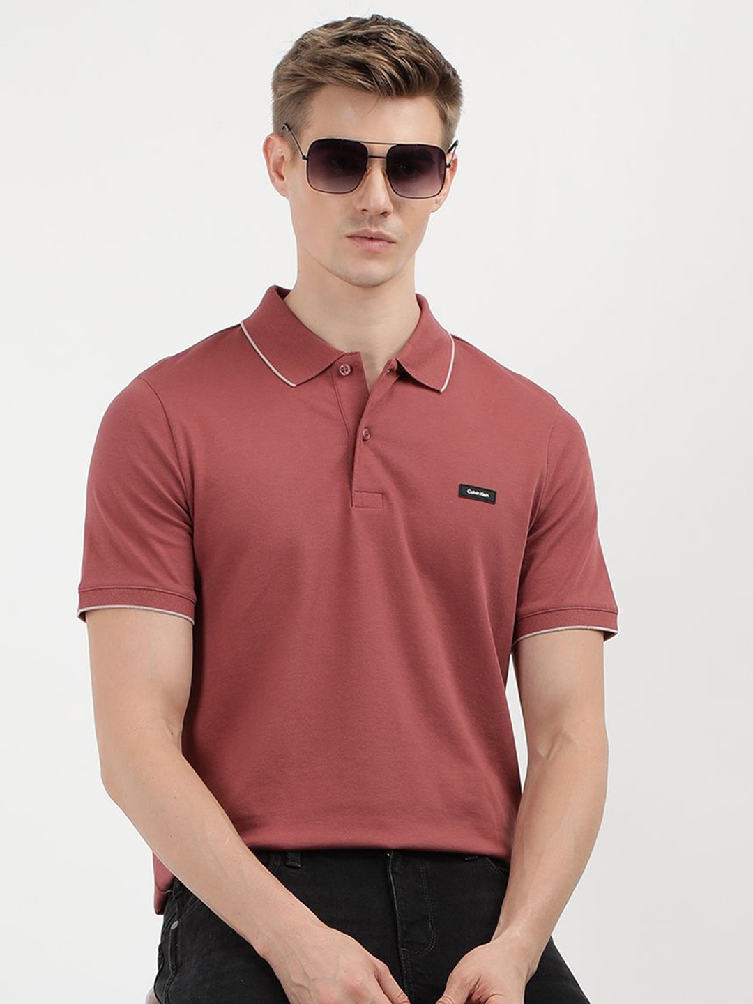 

Calvin Klein Jeans Men Solid Polo Collar Cotton Slim Fit Tshirt, Red