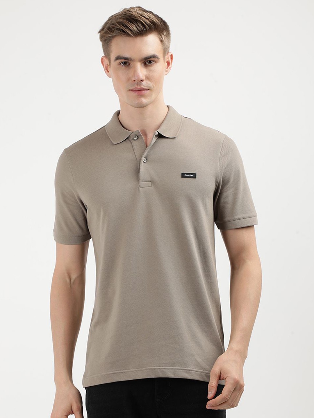 

Calvin Klein Jeans Men Solid Polo Collar Cotton Slim Fit Tshirt, Beige