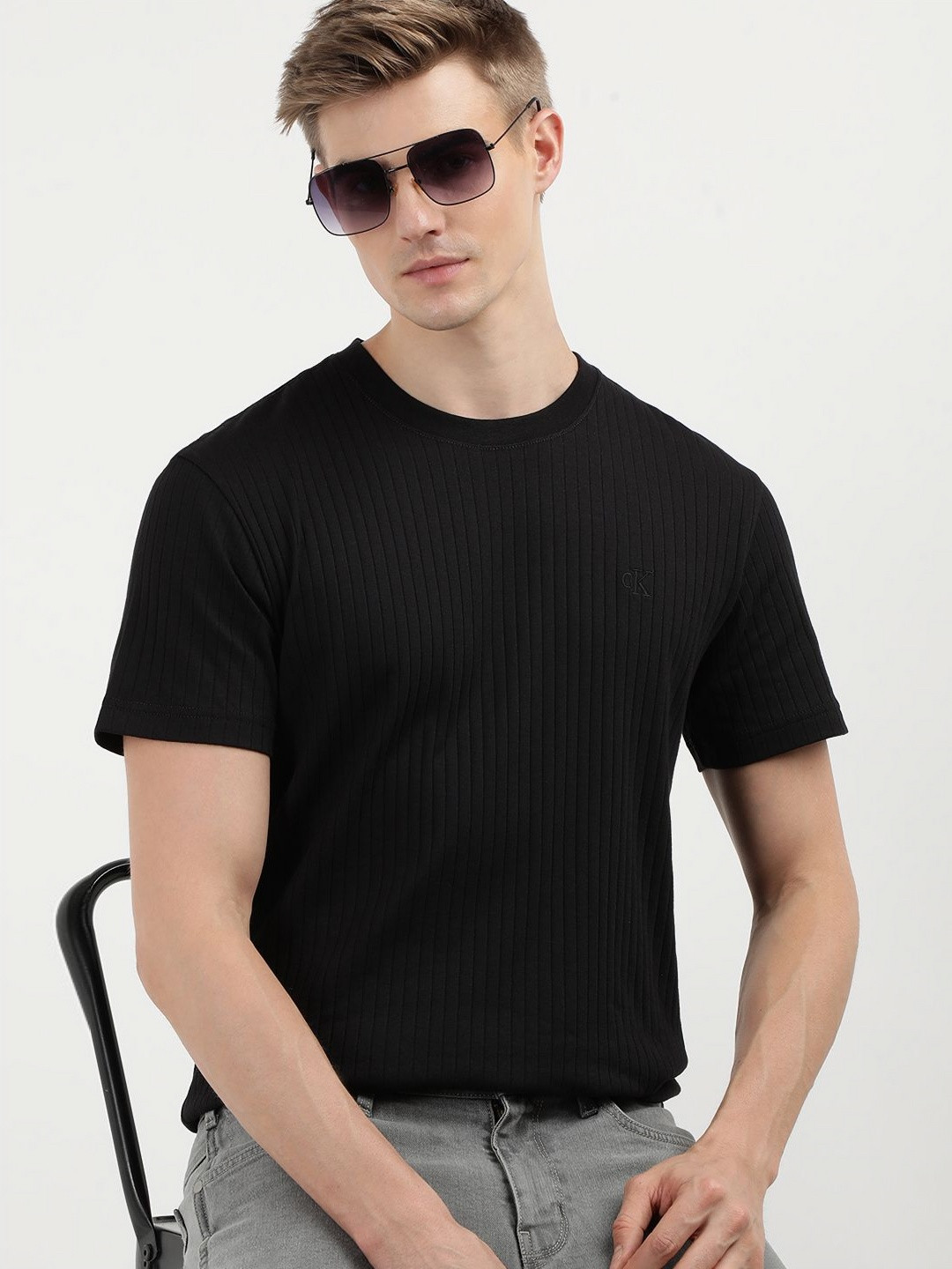 

Calvin Klein Jeans Men Solid Round Neck Cotton Tshirt, Black