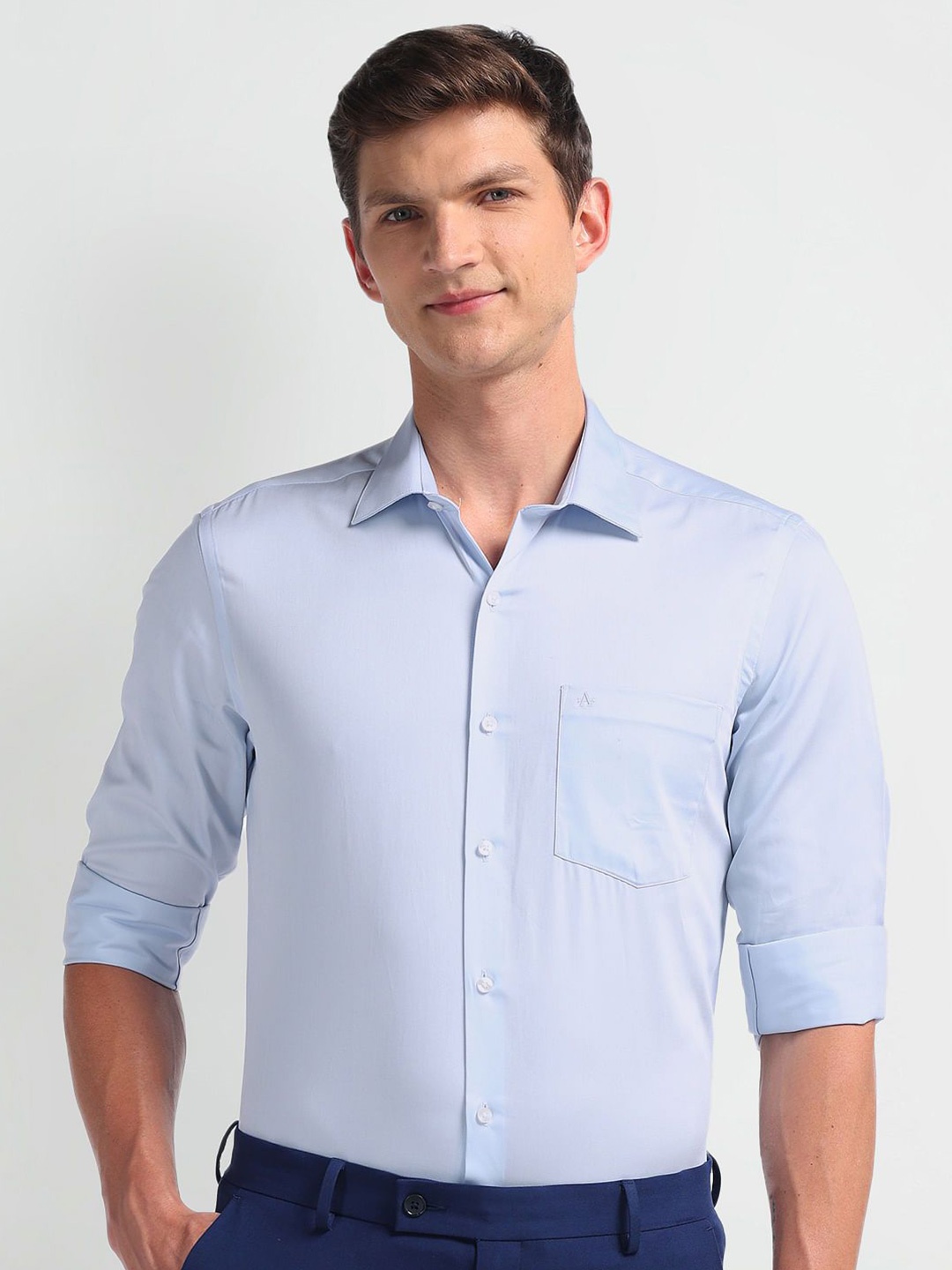 

Arrow Men Solid Cotton Formal Shirt, Blue