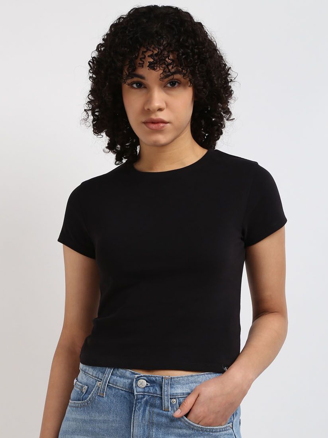 

Calvin Klein Jeans Women Solid Round Neck Cotton Slim Fit Tshirt, Black