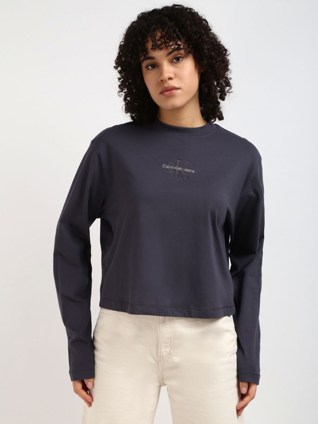 

Calvin Klein Jeans Women Solid Round Neck Cotton Relaxed Fit Tshirt, Navy blue
