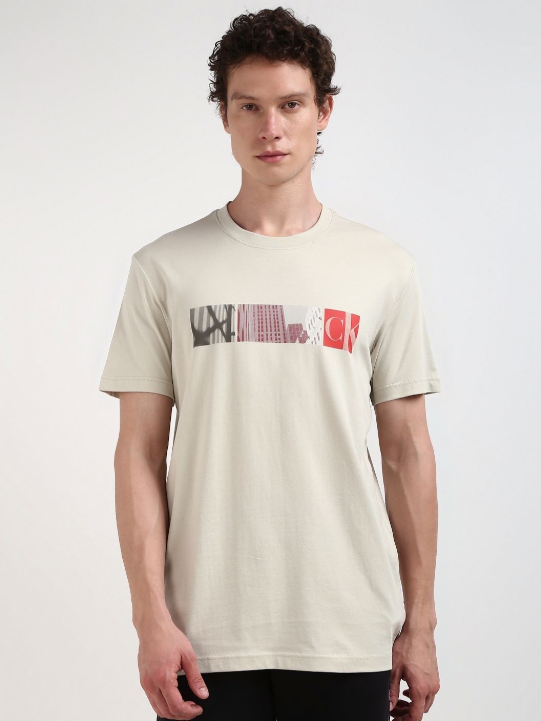 

Calvin Klein Jeans Men Printed Round Neck Cotton Tshirt, Beige