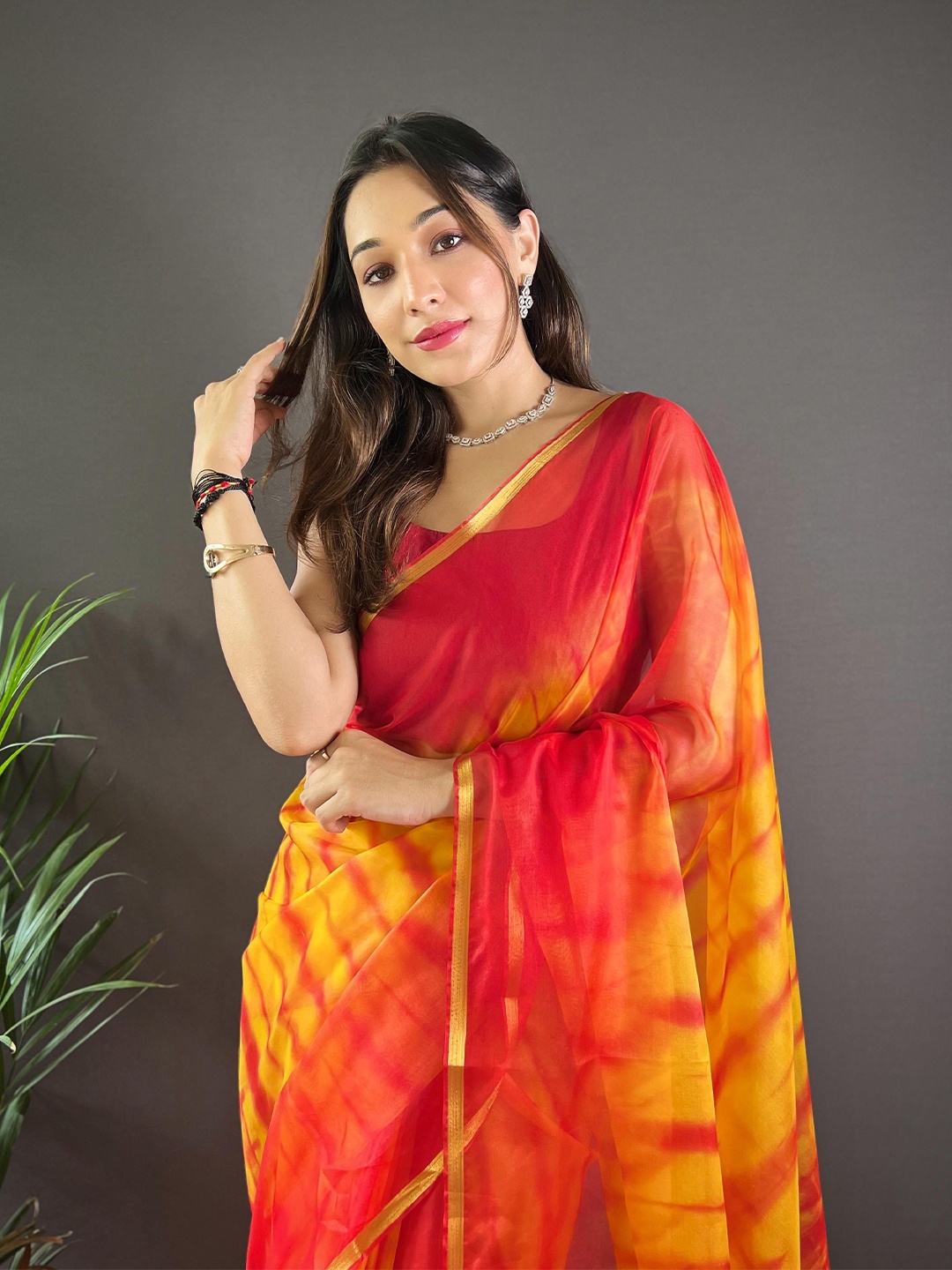 

Vastrasky Global Tie & Dye Zari Woven Saree, Yellow