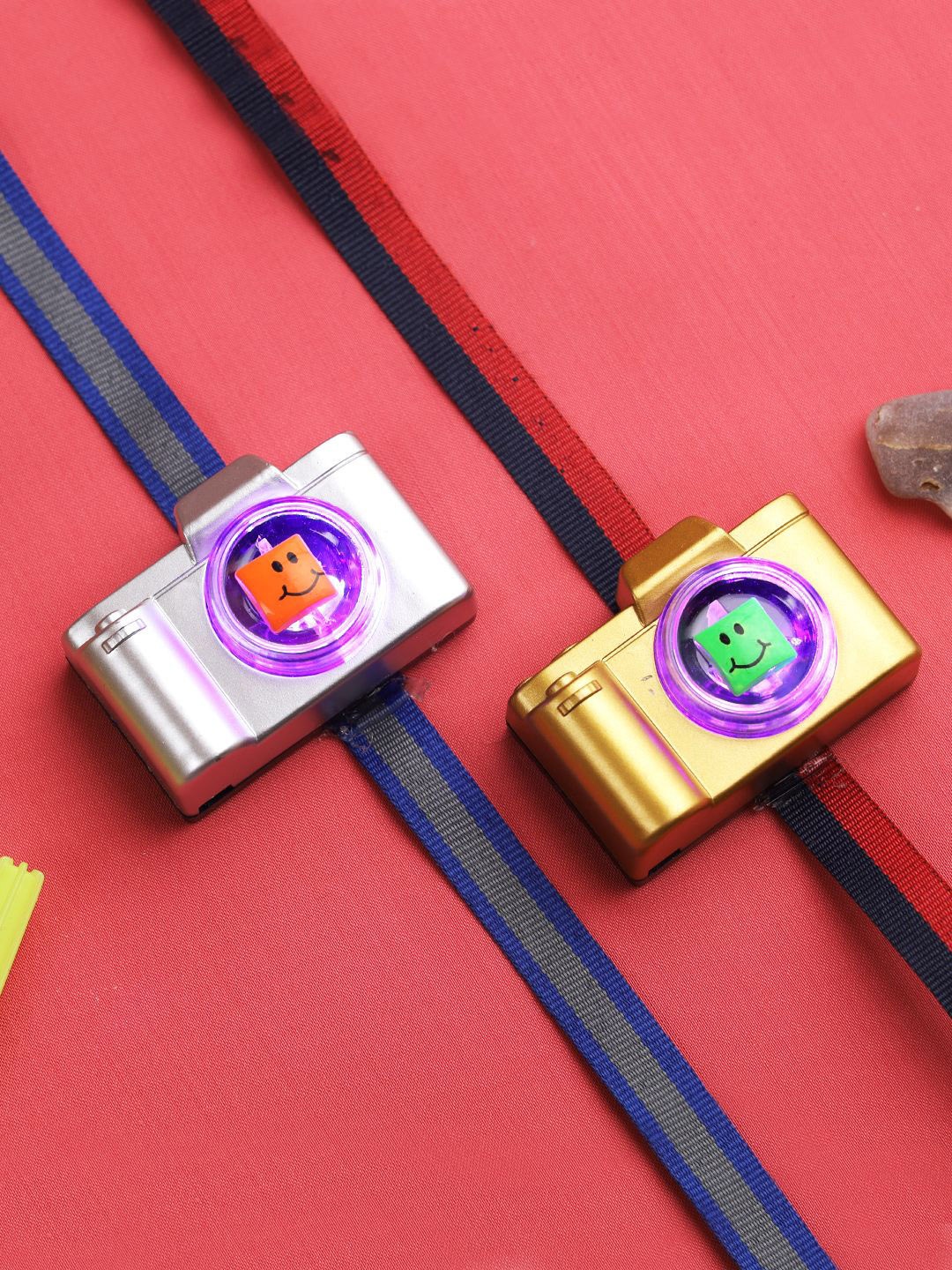 

Kook N Keech Gold-Toned Set of 2 Stylish Camera Wraparound Rakhis With Roli Chawal