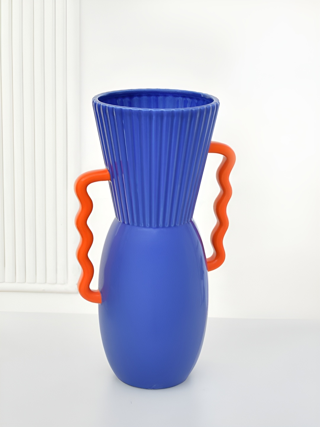 

Athome by Nilkamal Blue & Orange Colored Textured Flower Vase