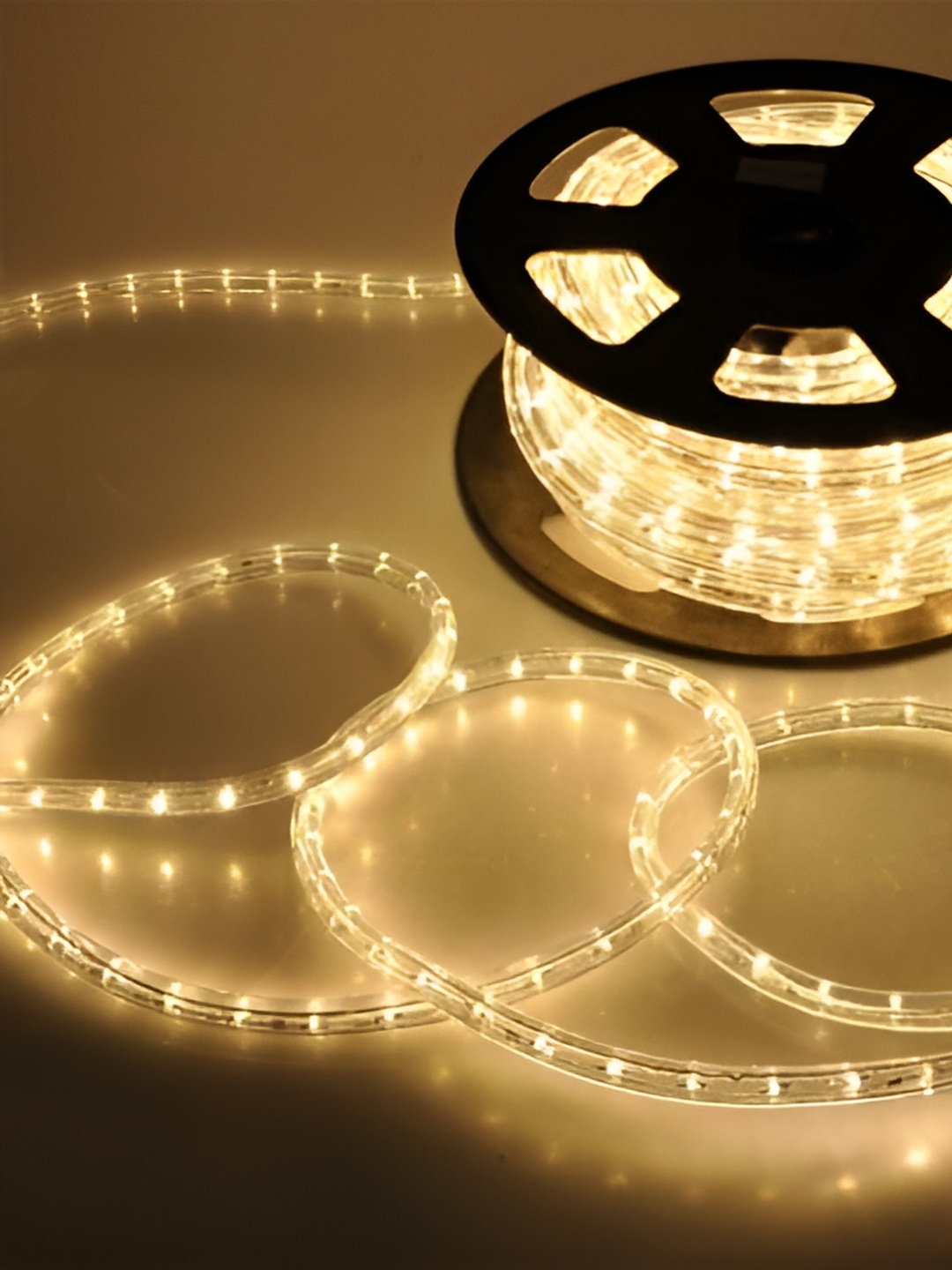 

ENORMITY Gold Toned & Black Rice Shape String Lights