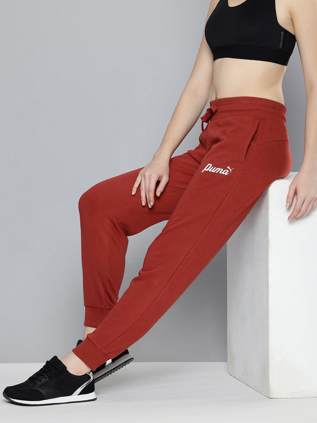 

Puma Women Ess+ Script Joggers, Rust