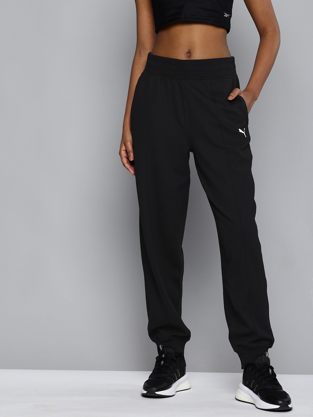 

Puma Women Her High Waist Self Design Comfort fit Joggers, Black