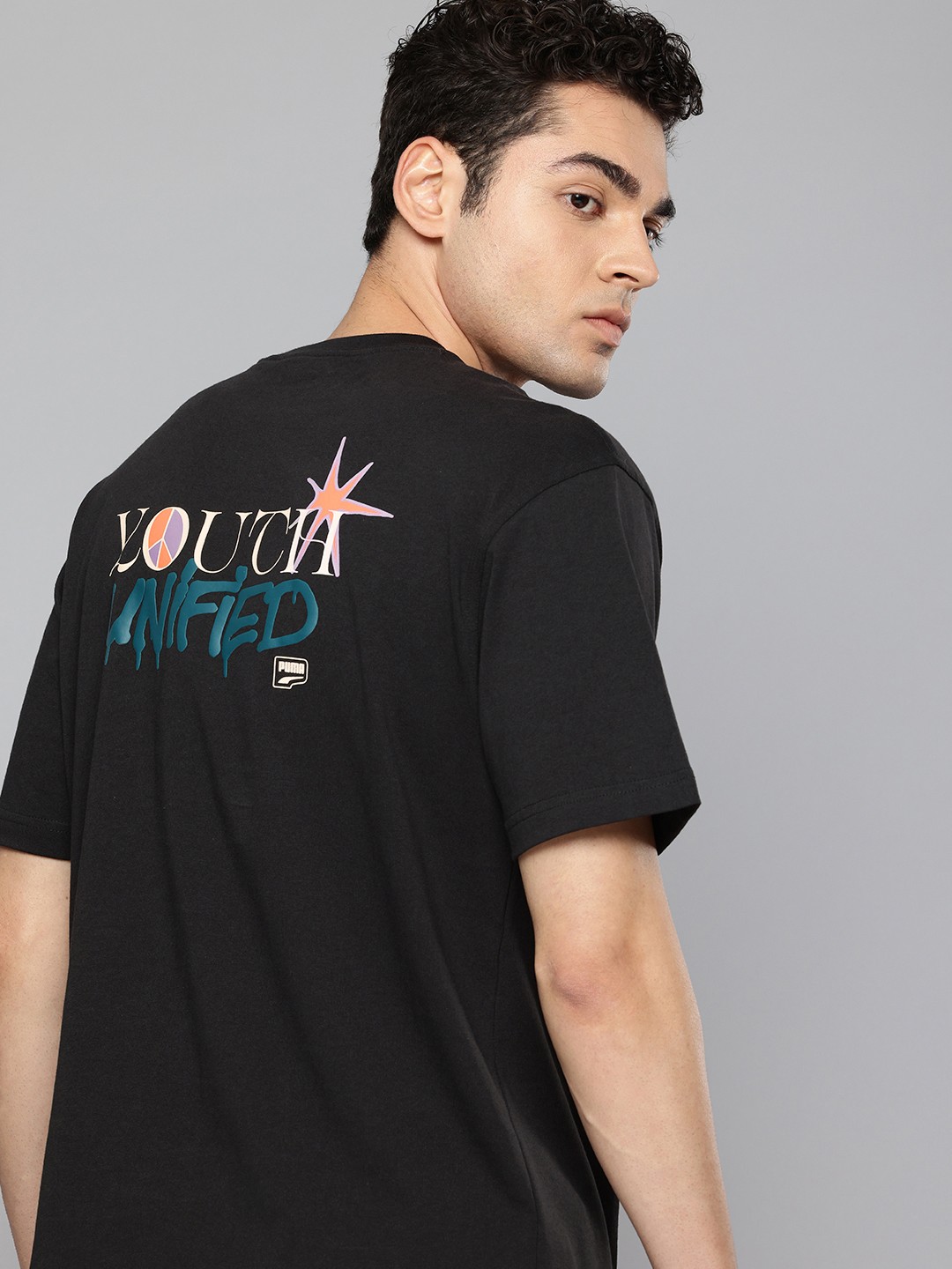 

Puma DOWNTOWN Graphic Typography Printed Drop-Shoulder Sleeves Relaxed Fit Outdoor T-shirt, Black