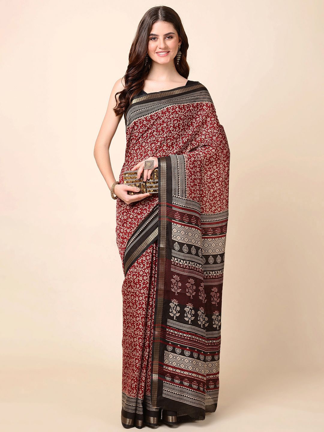 

Meena Bazaar Ethnic Motifs Zari Woven Saree, Maroon