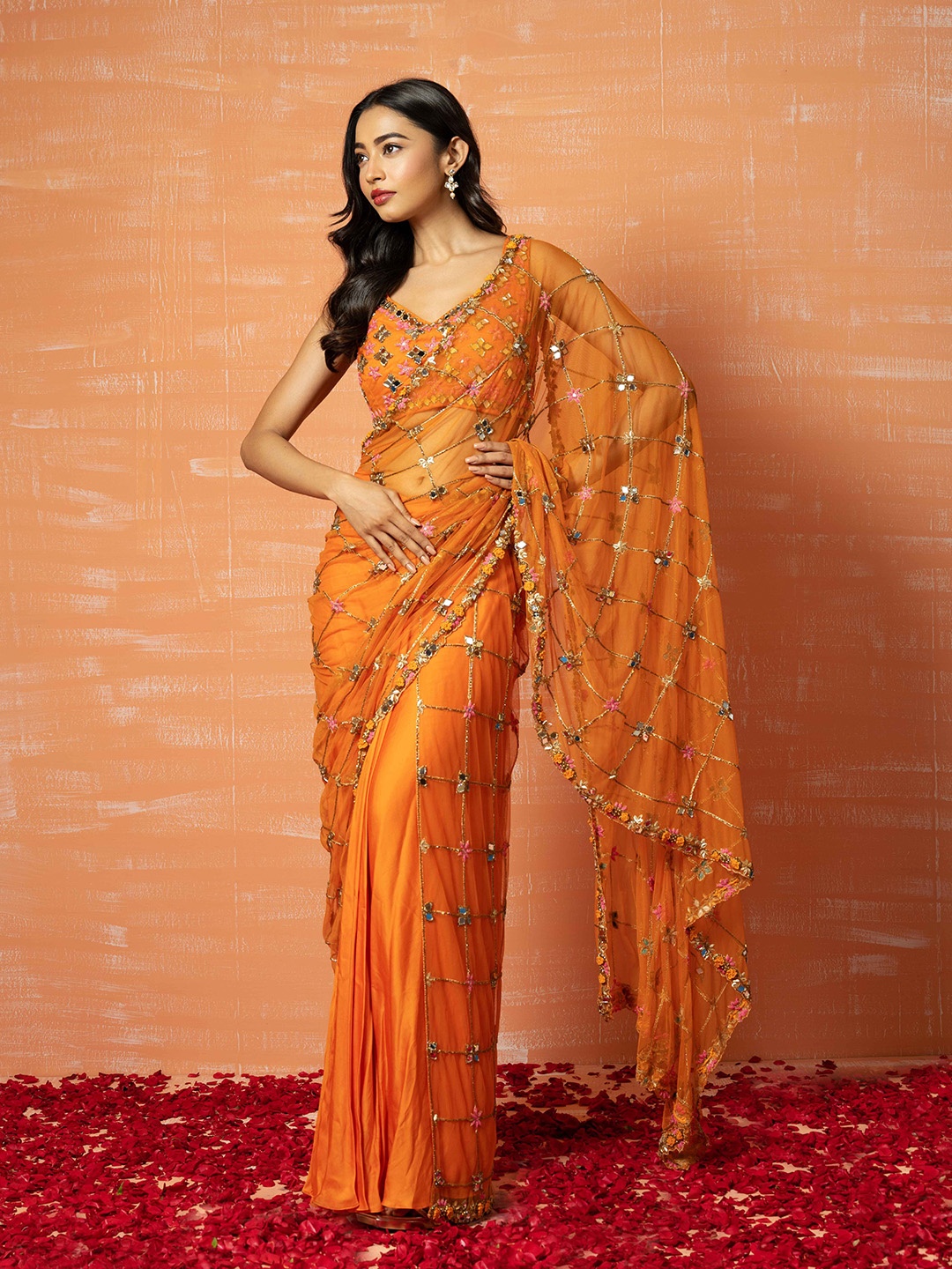 

Quench A Thirst Ethnic Motifs Beads and Stones Net Saree, Orange