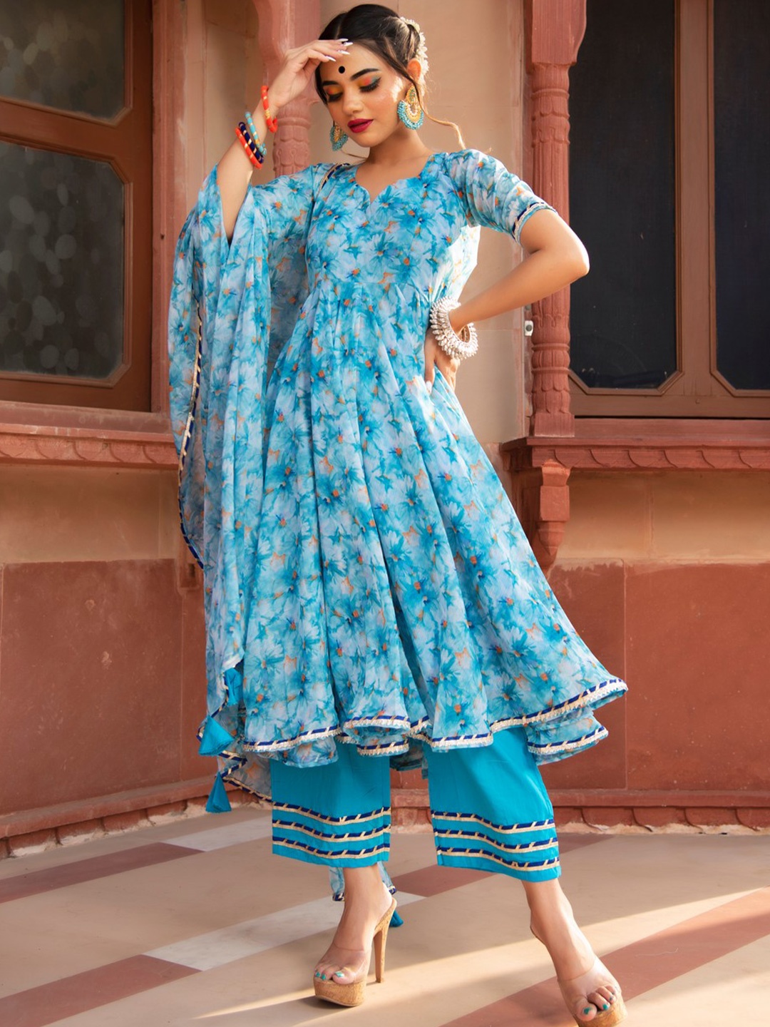 

Pomcha Women Printed Regular Kurta with Salwar & With Dupatta, Blue