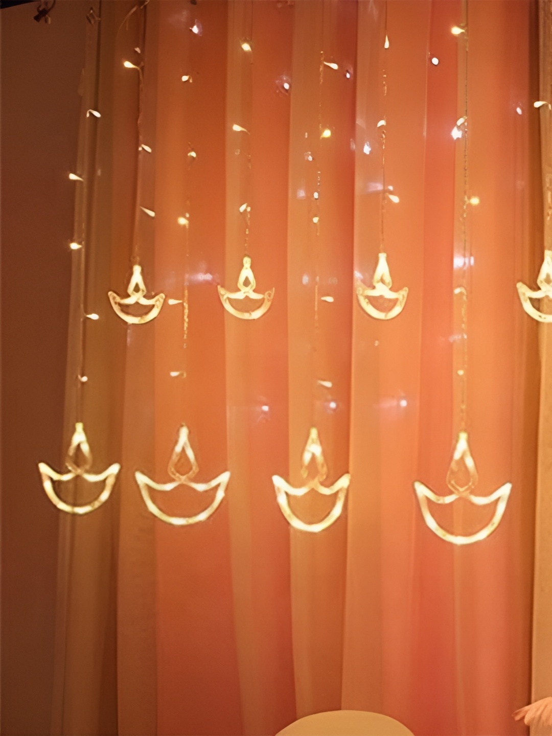 

ENORMITY Yellow Diya Shaped String Lights