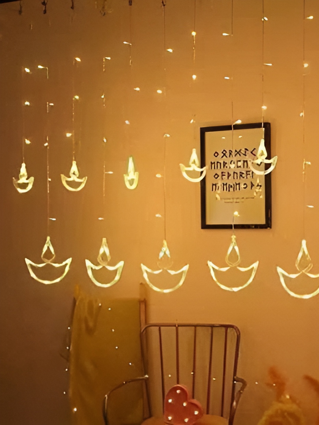 

ENORMITY Yellow Diya Shaped String Lights