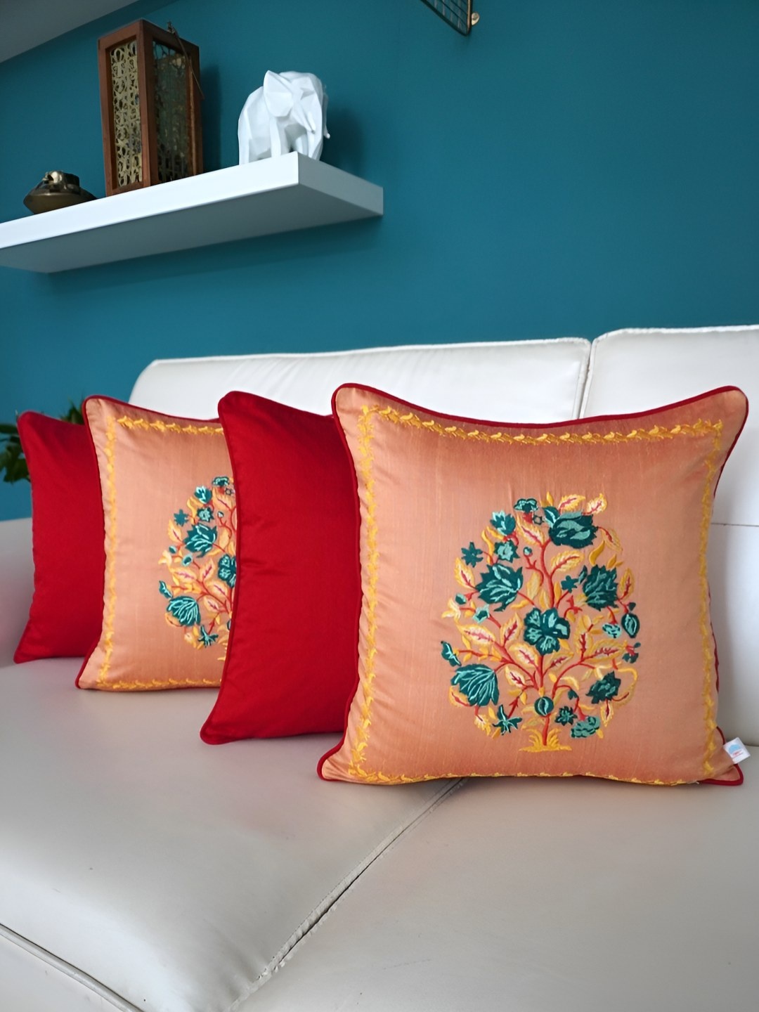 

TARA- Sparkling Homes Peach-Coloured & Teal Set of 4 Embroidered Square Cushion Covers