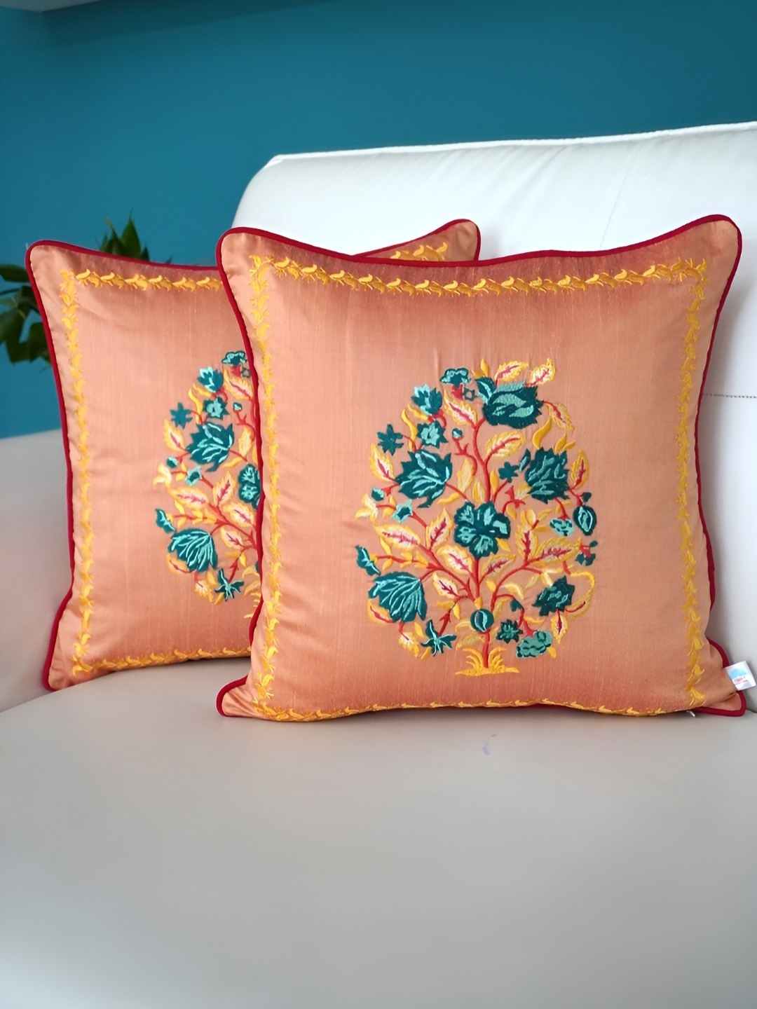 

TARA- Sparkling Homes Peach-Coloured & Green Set of 2 Embroidered Square Cushion Covers