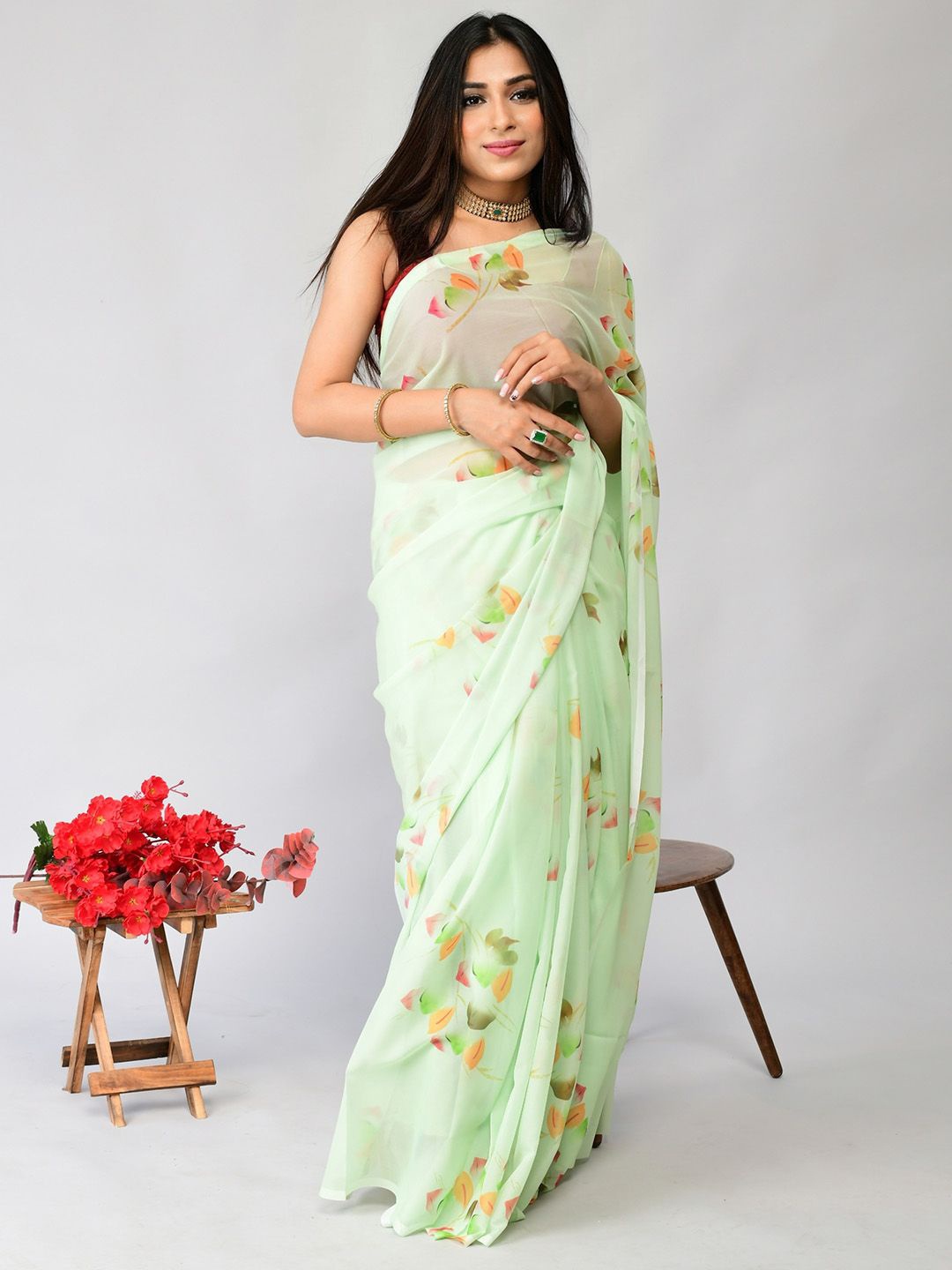 

Ishin Floral Pure Georgette Saree, Green