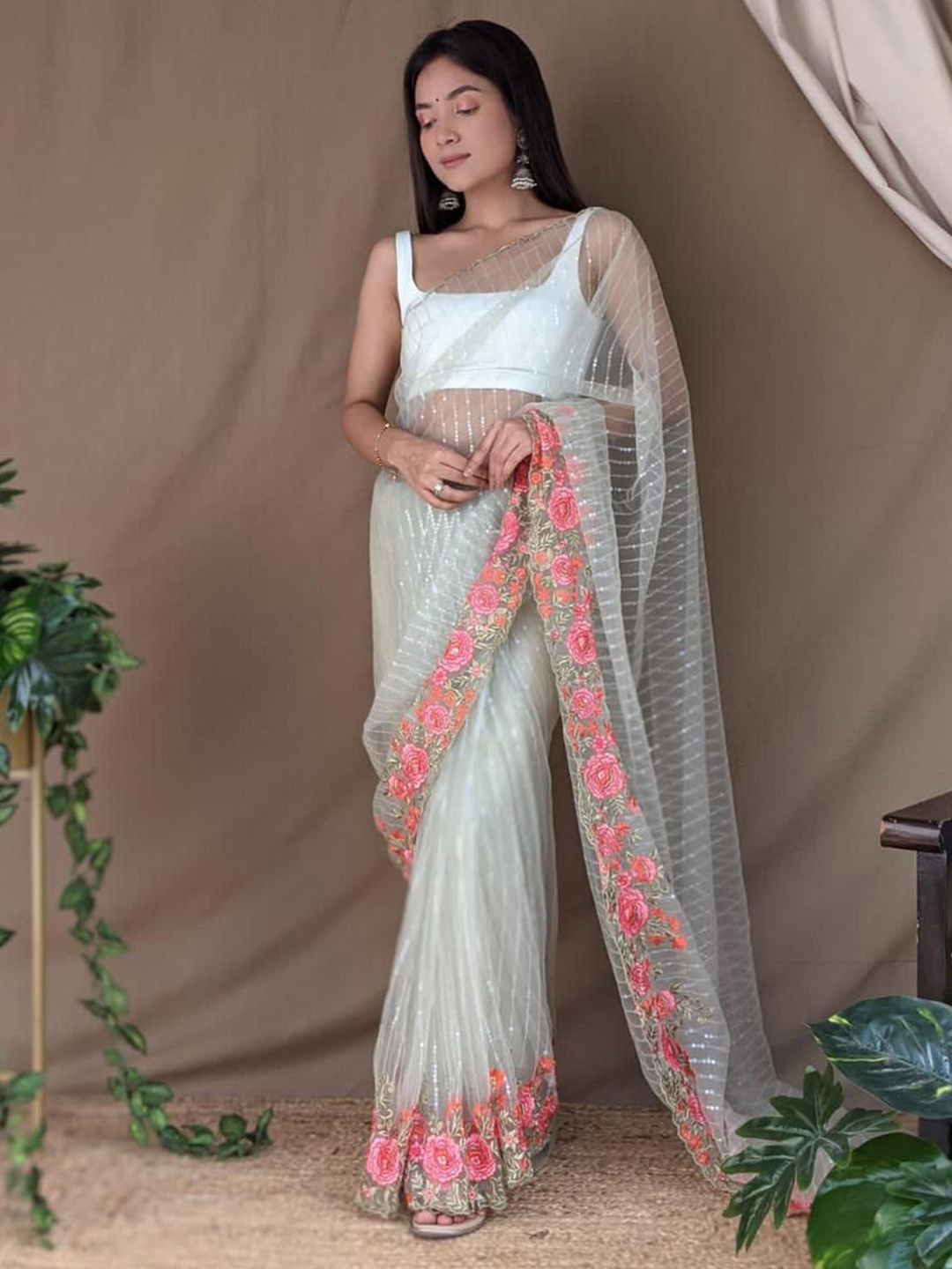 

Ishin Striped Sequinned Net Saree, Blue