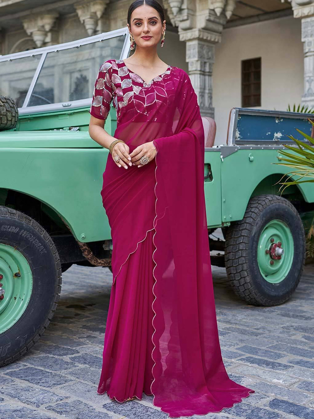 

Jinal & Jinal Sequinned Pure Georgette Saree, Magenta