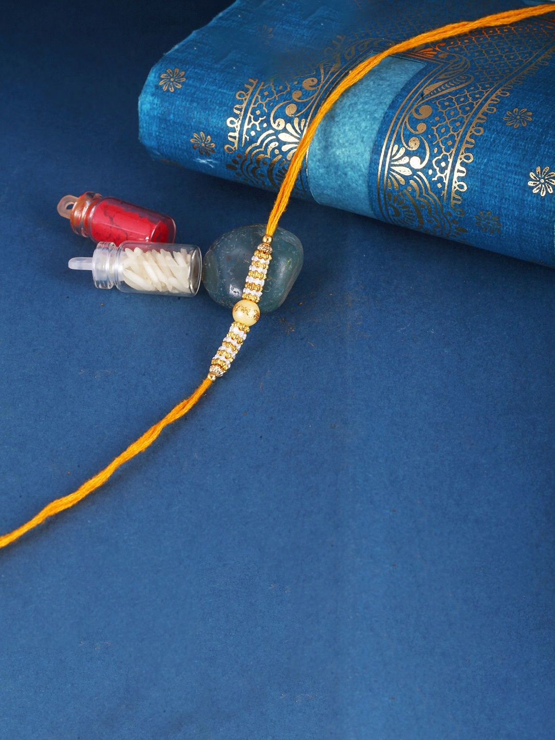 

Vighnaharta Thread Rakhi, Yellow