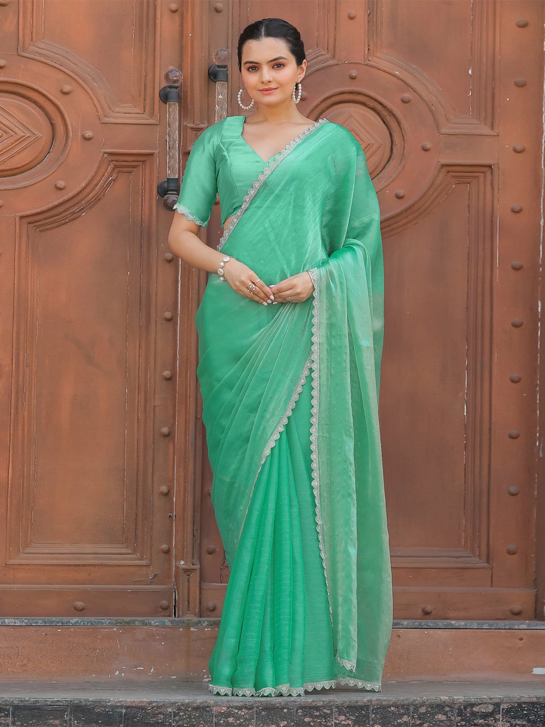 

Jinal & Jinal Embellished Embroidered Silk Blend Saree, Teal