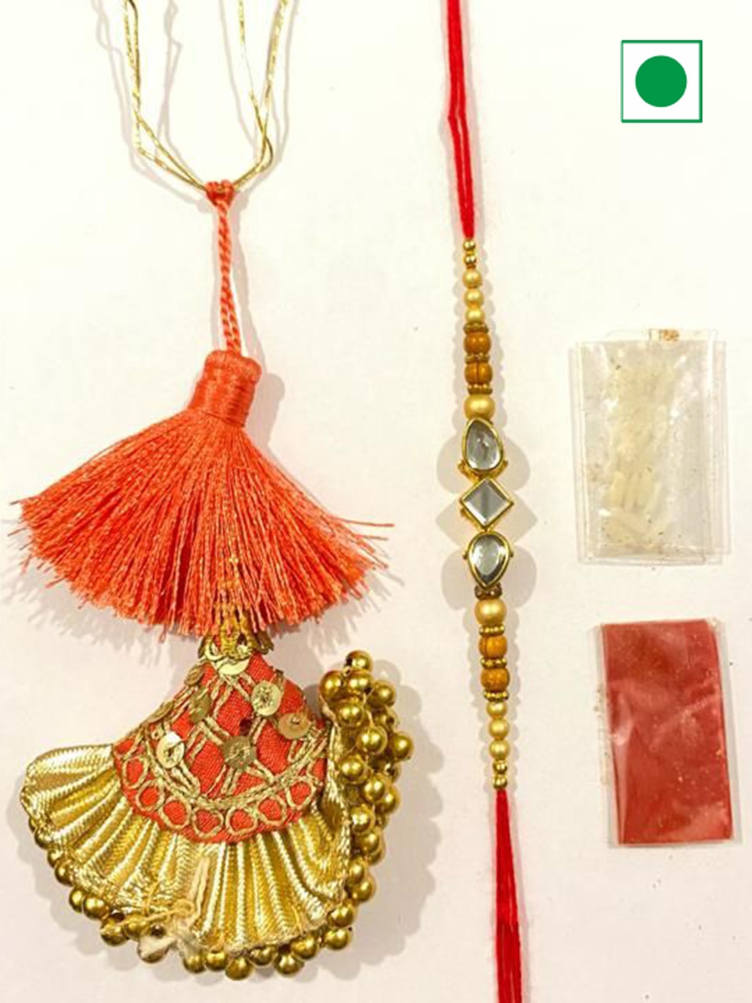 

Wishbox 2-Pcs Rakhi & Orange Dates With Tikka & Rice, Brown