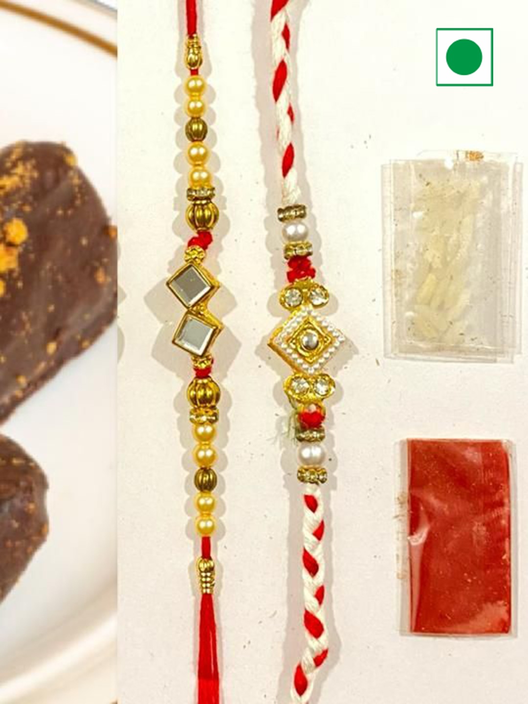 

Wishbox 2-Pcs Rakhi & Lotus Biscoff Dates With Tikka & Rice, Brown